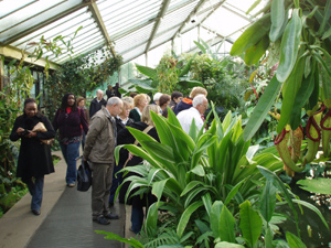 Adrian with members of the KGG party in the Princess of Wales Conservatory